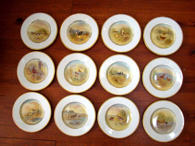 A fine and rare set of 12 hand painted Royal Doulton "Cabinet" plates featuring 'game birds' circa 1910